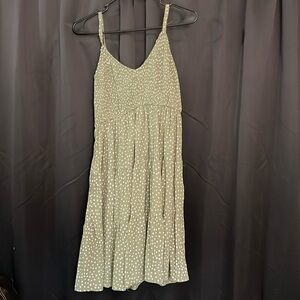 Green polkadot flows string dress